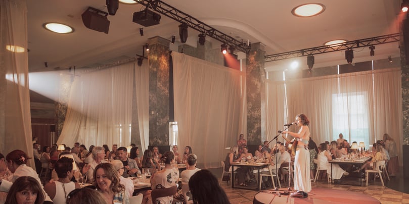 Wide shot of Little Green performing at Long Summer Lunch
