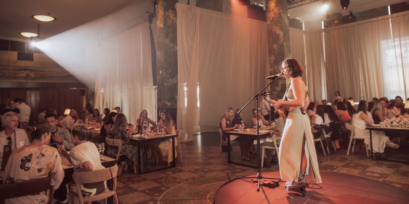 Little Green performing to the attendees at Long Summer Lunch