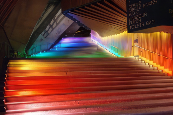 Sydney opera house steps in rainbow colours