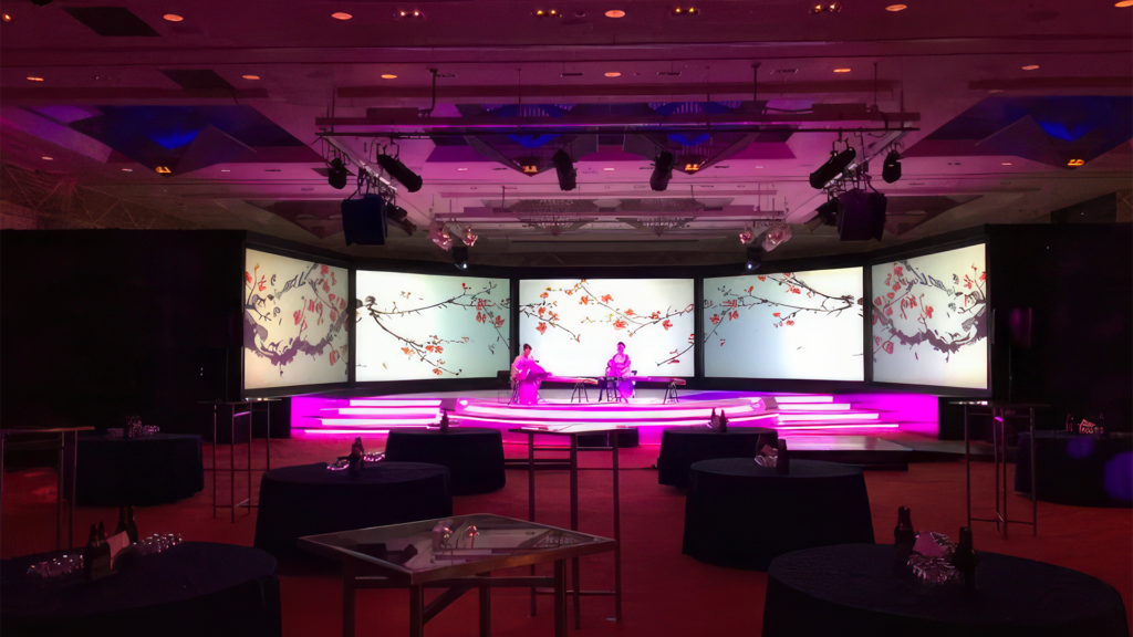 Custom stage with LED trim and rear projection backdrop in Tokyo