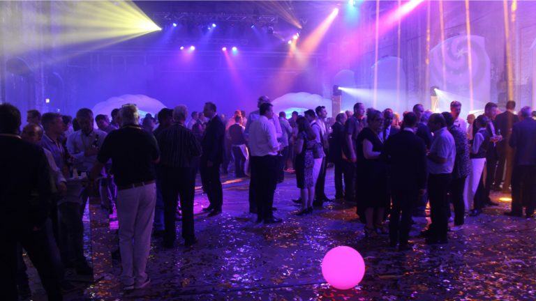 Multi-coloured spotlights for a corporate networking drinks