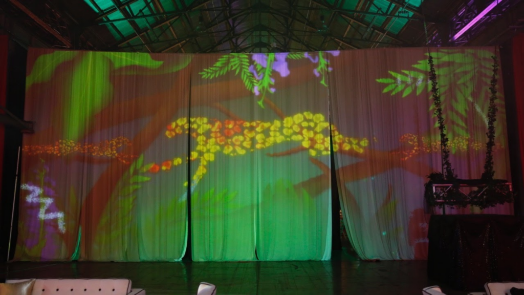 Jungle themed projection on drapes
