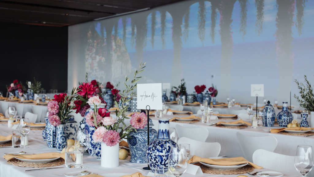 Lemon floral Italian theme at AV1's Long Summer Lunch 2022 with a wall projection
