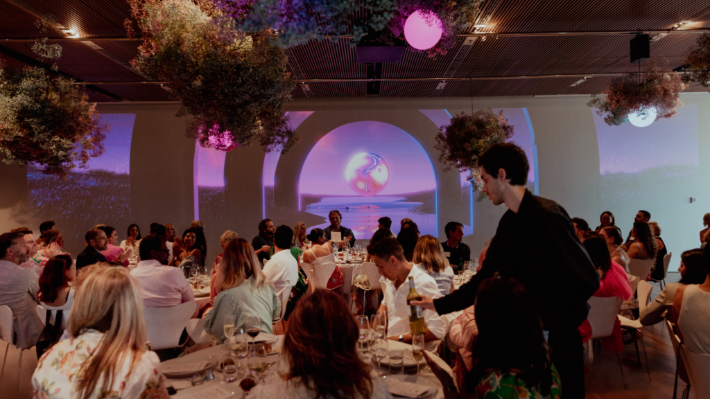 Dream themed Long Summer Lunch 2023 with hanging flowers and sphere lighting
