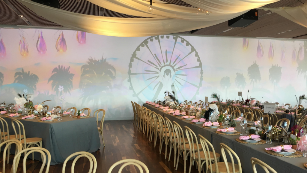 Festival themed Long Summer Lunch 2019 with projection blend on the wall