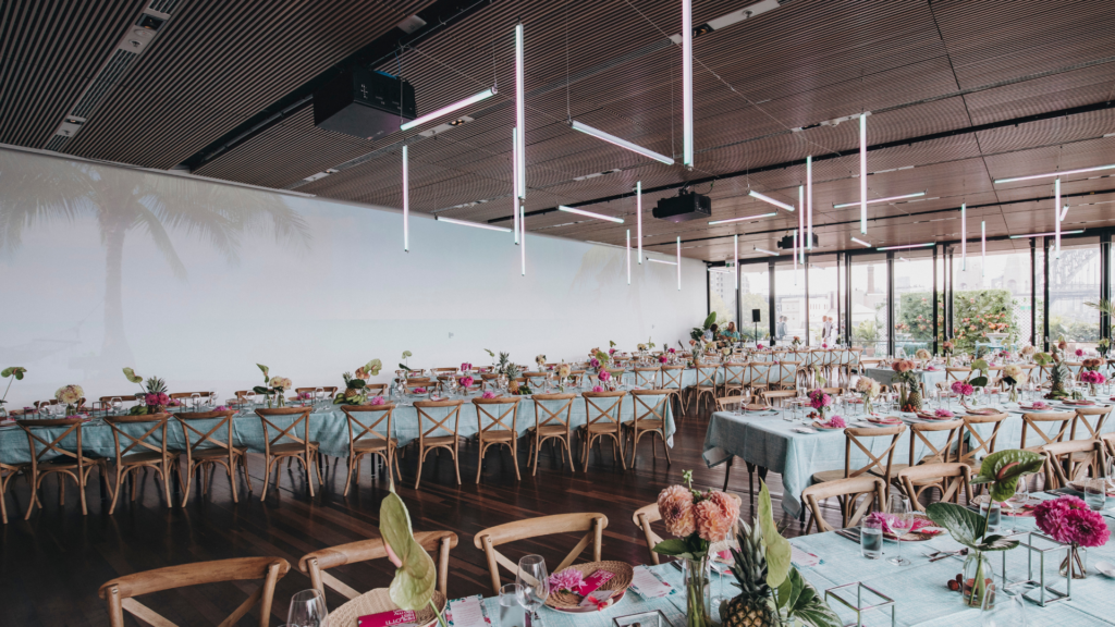 Hawaiian themed Long Summer Lunch 2018 with hanging LED tube lighting