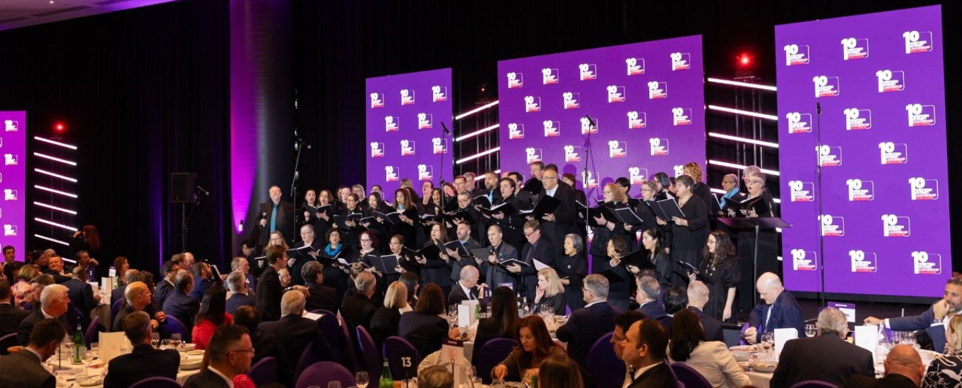 Choir on stage at WSLD 'A Decade of the Dialogue'