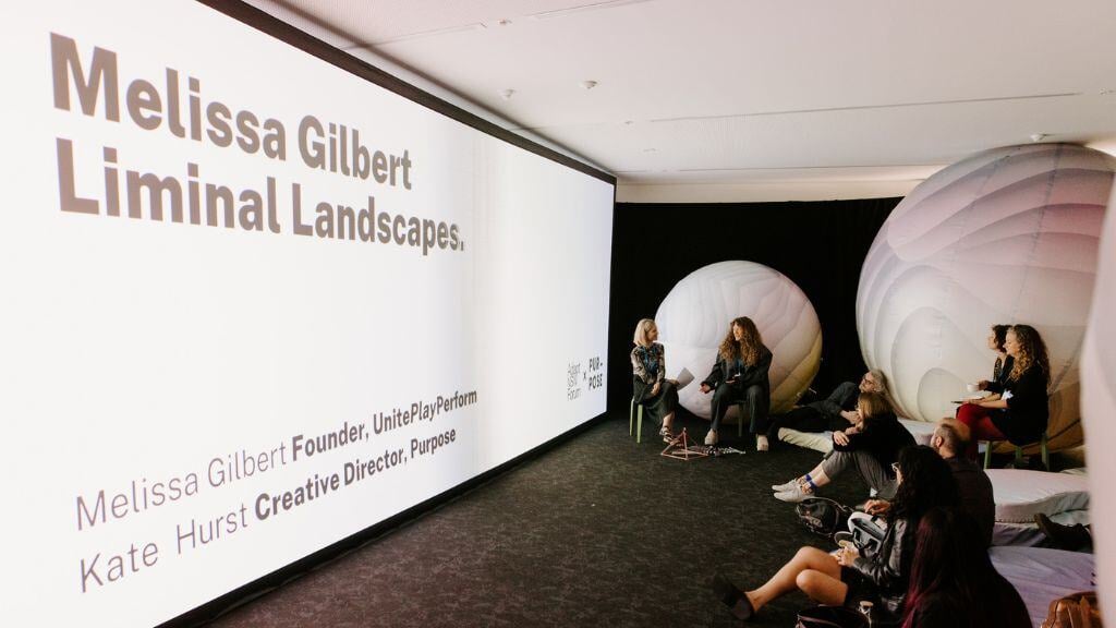 A panoramic projection stating the artist's name (Melissa Gilbert), showcasing the installation